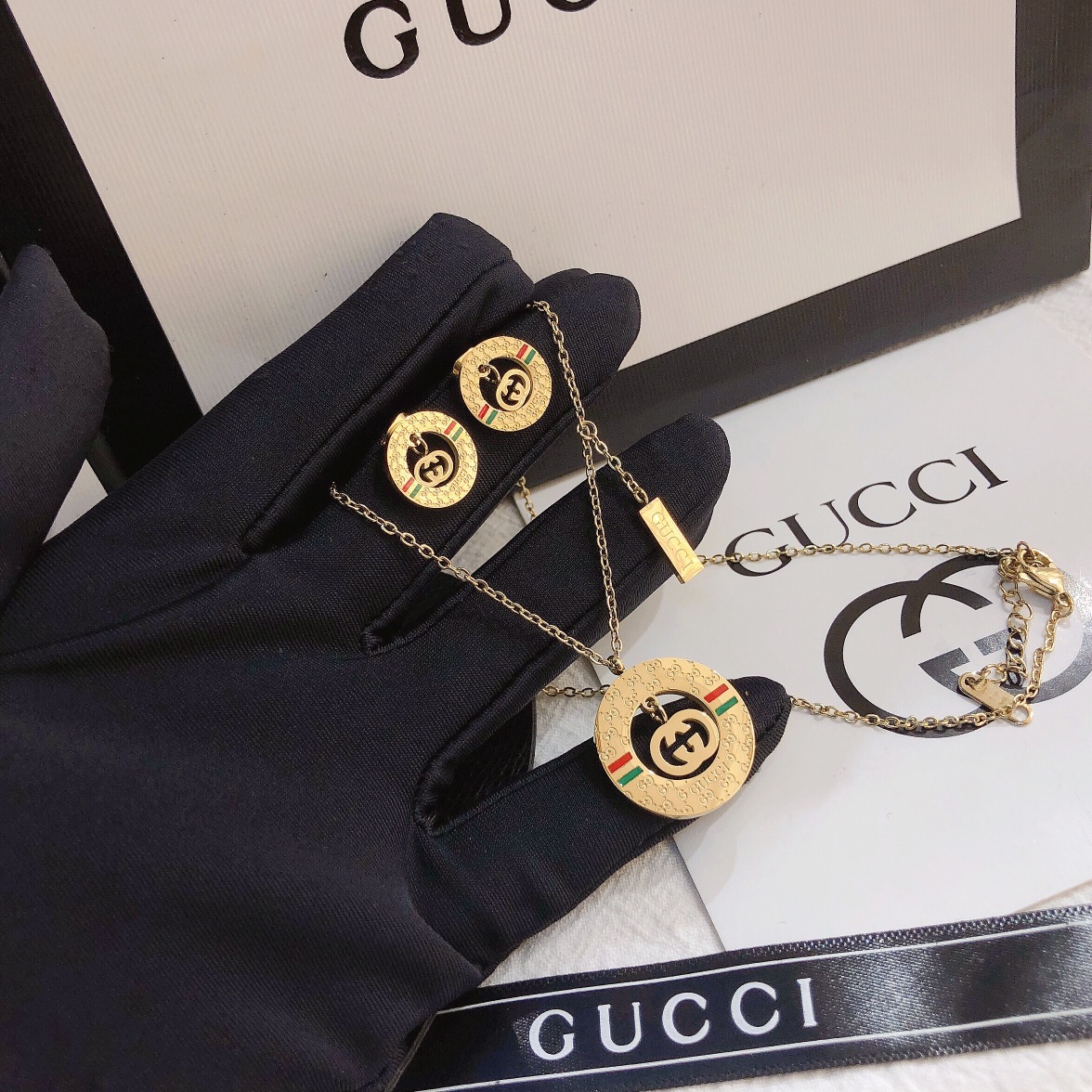 Gucci earrings/necklace 106342