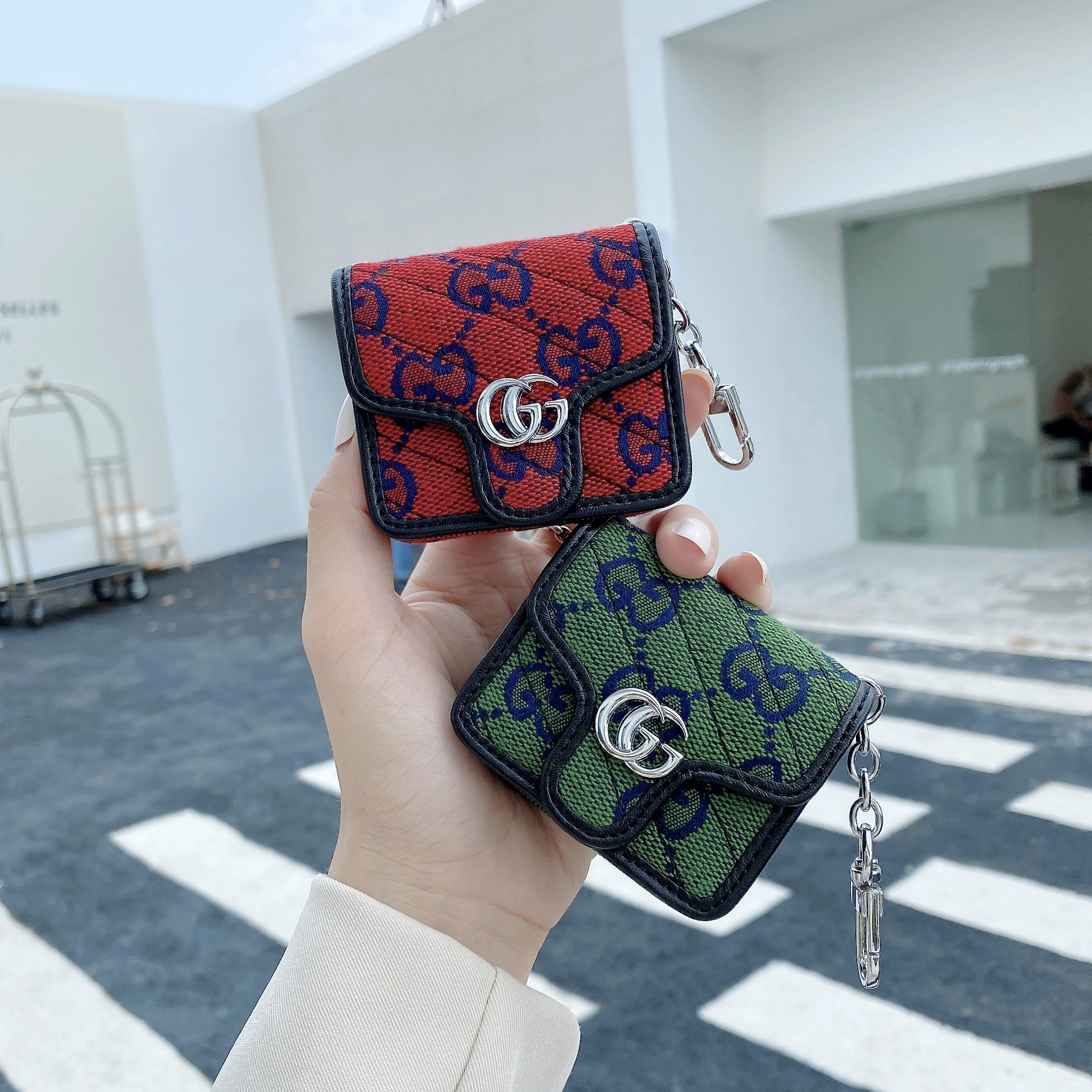 Gucci earphone case with chain