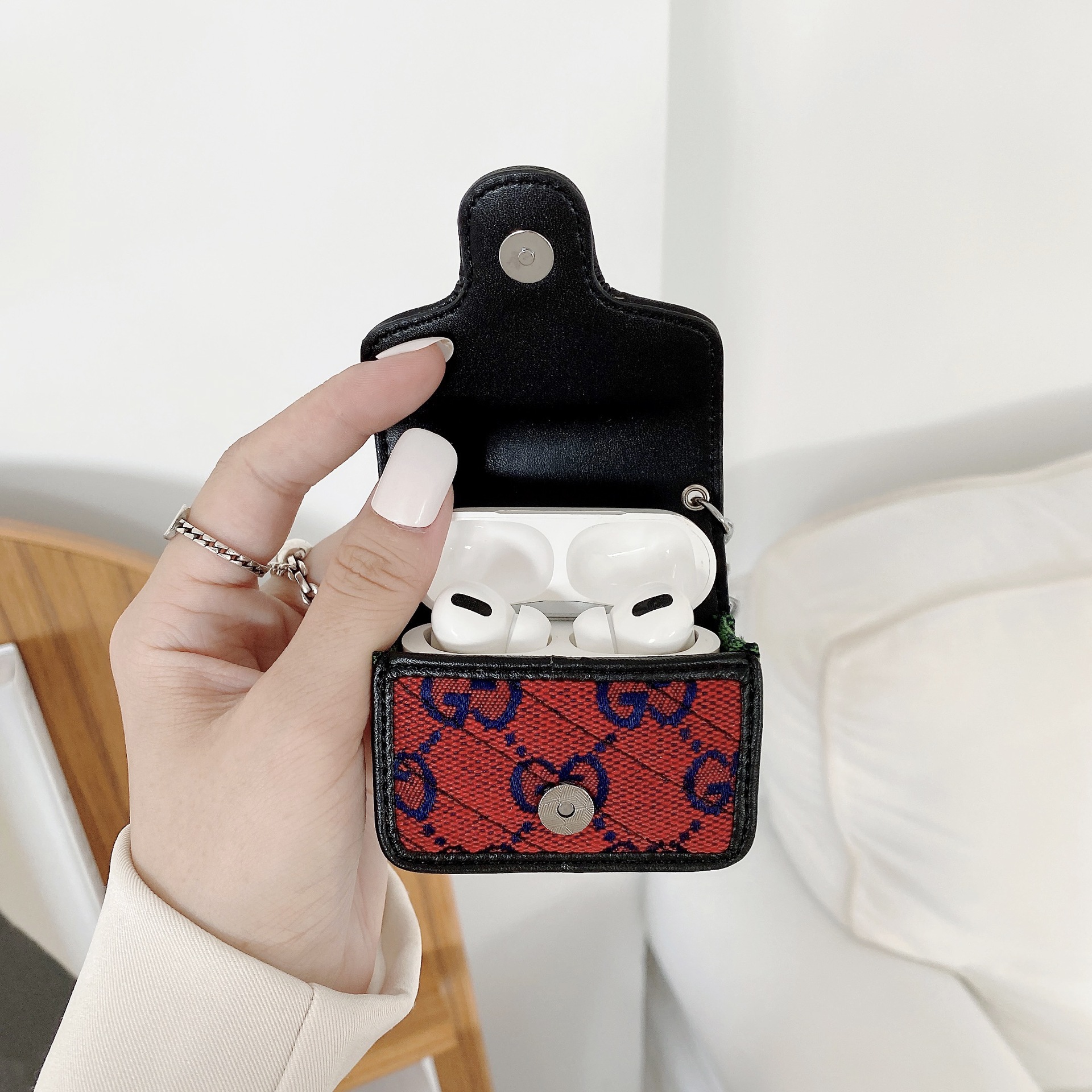 Gucci earphone case with chain