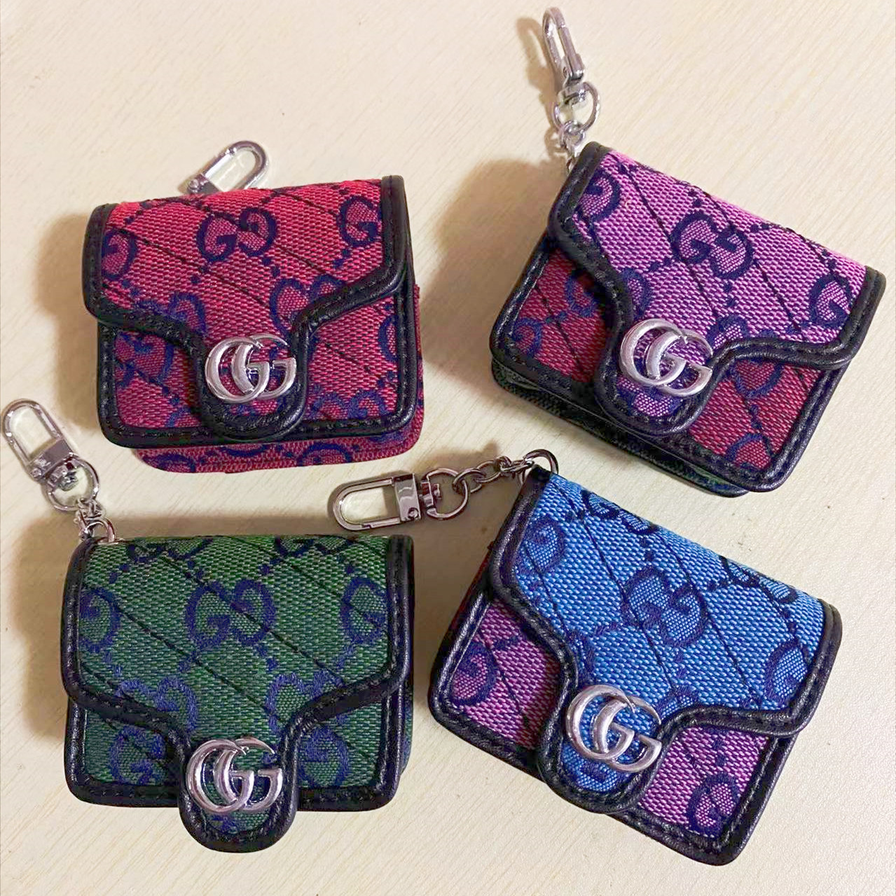 Gucci earphone case with chain