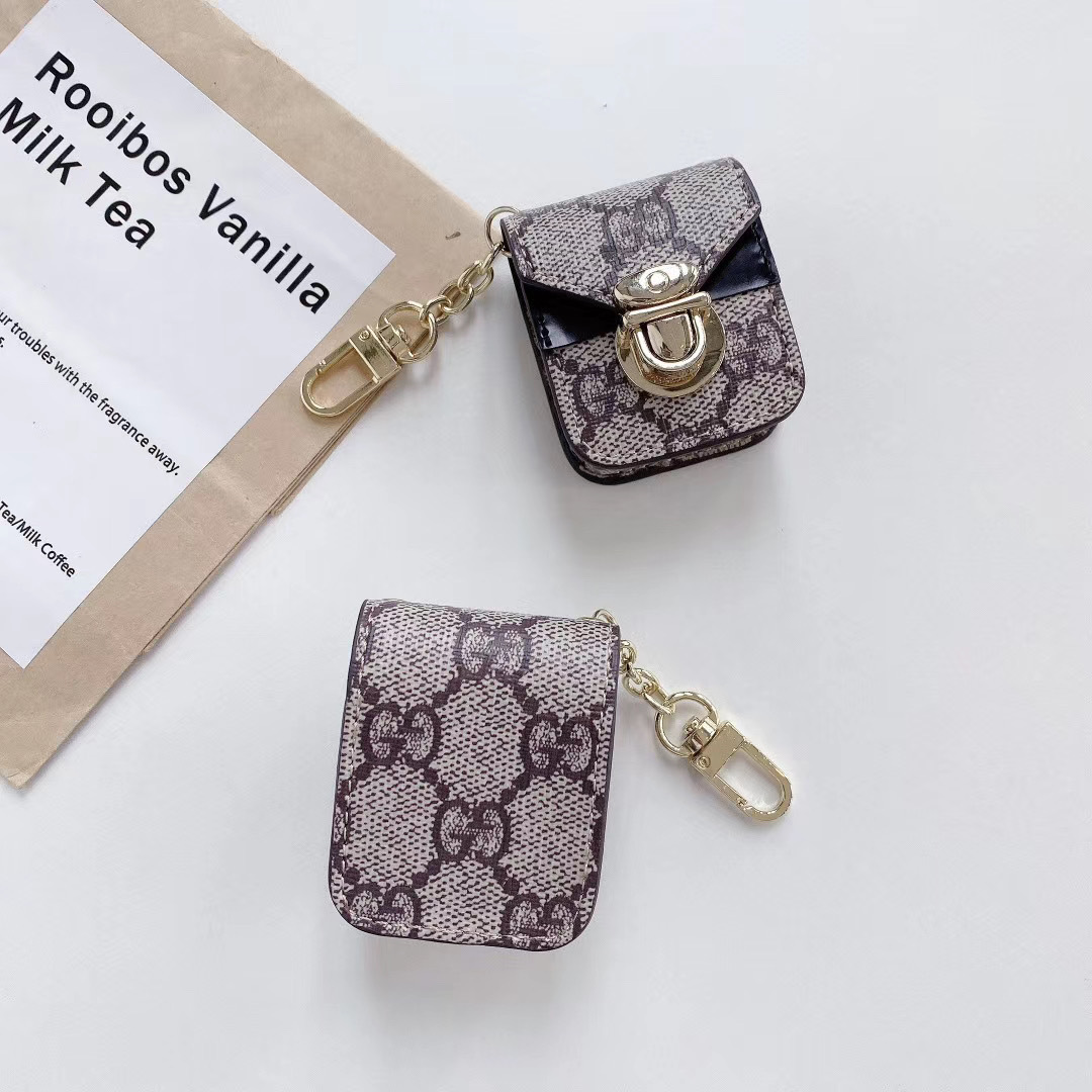 Gucci earphone case with chain
