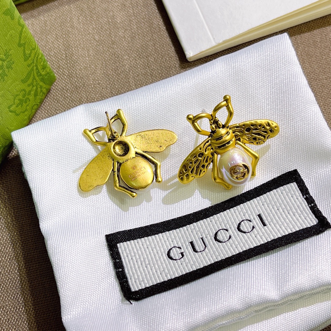 A699 Gucci vintage copper bee earring 108591