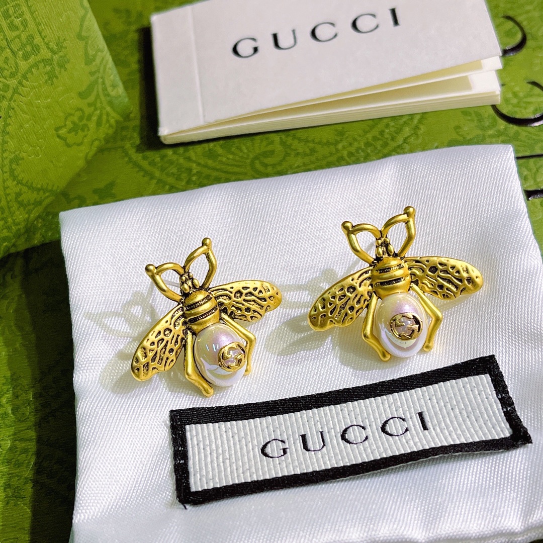 A699 Gucci vintage copper bee earring 108591