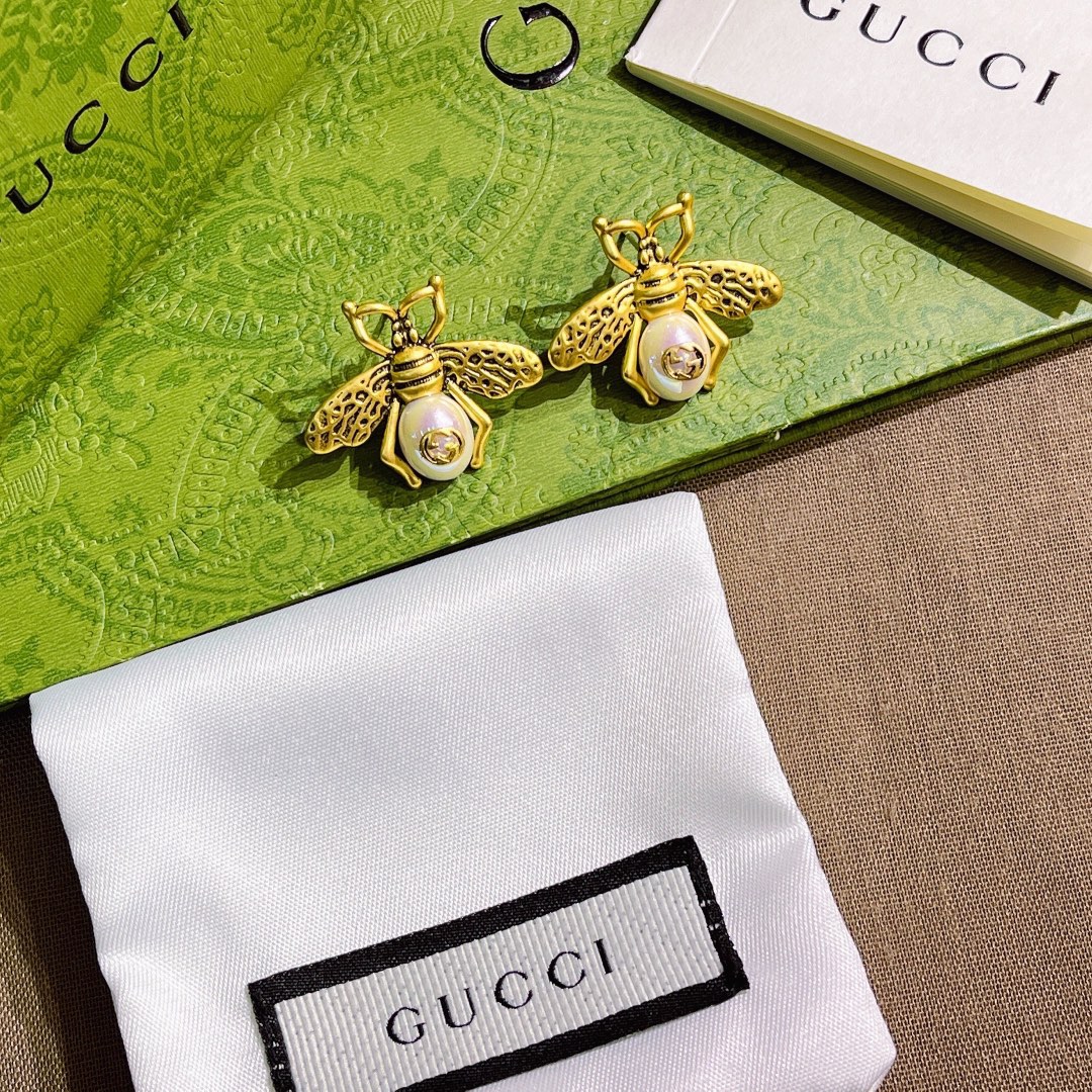 A699 Gucci vintage copper bee earring 108591