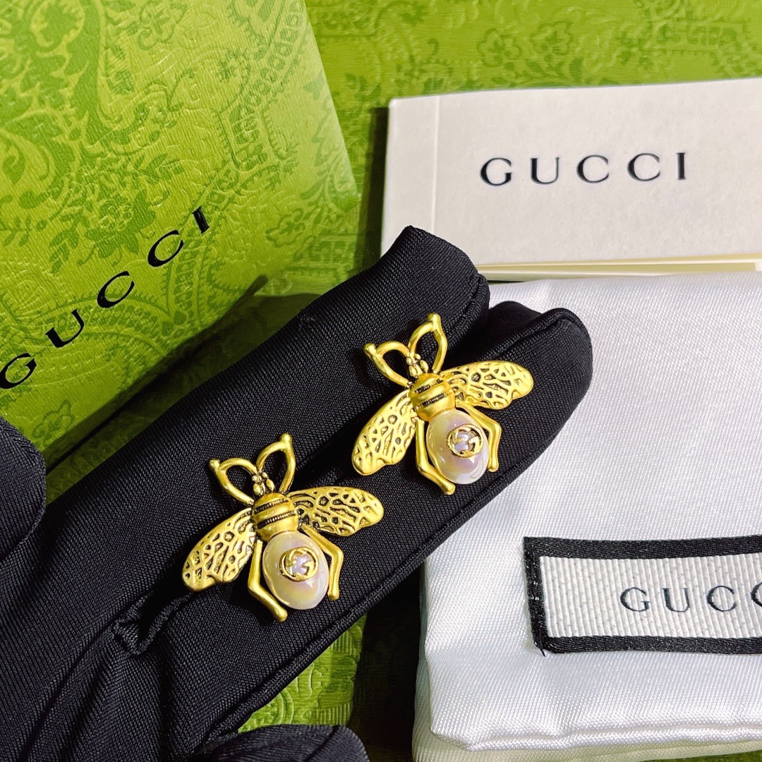 A699 Gucci vintage copper bee earring 108591