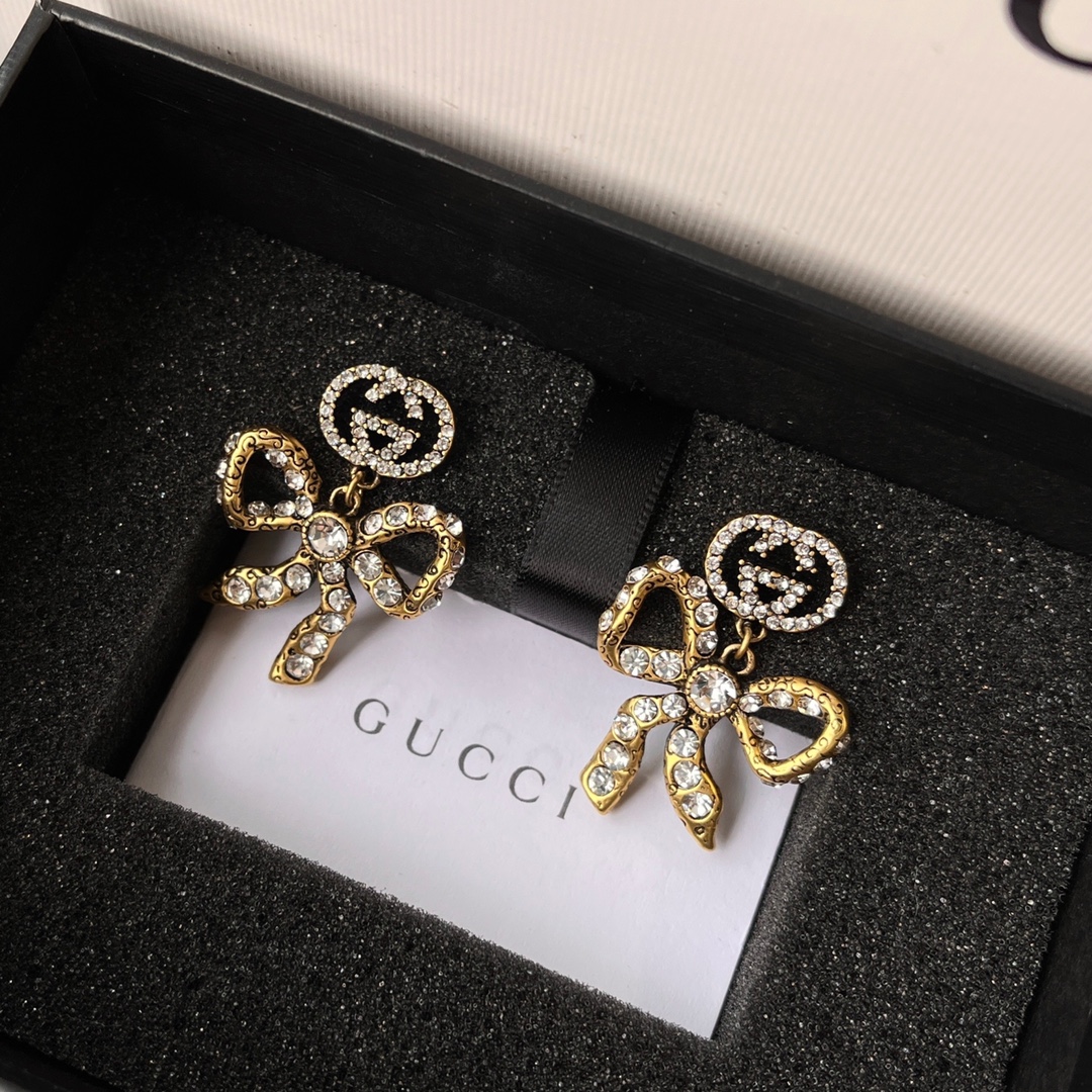 A750 Gucci butterfly bow earrings