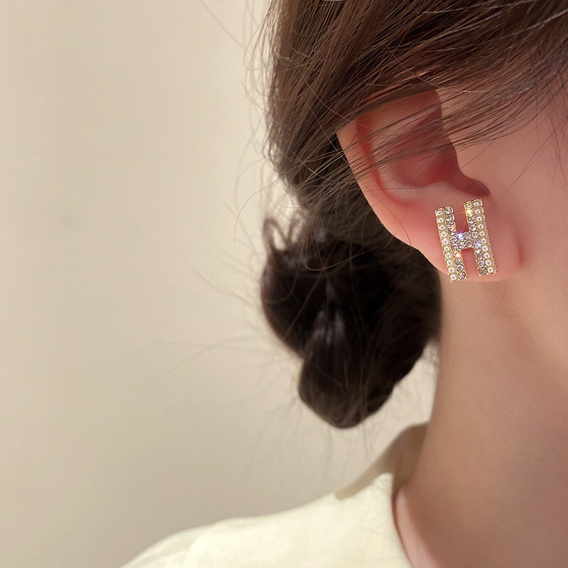 Hermes H earrings