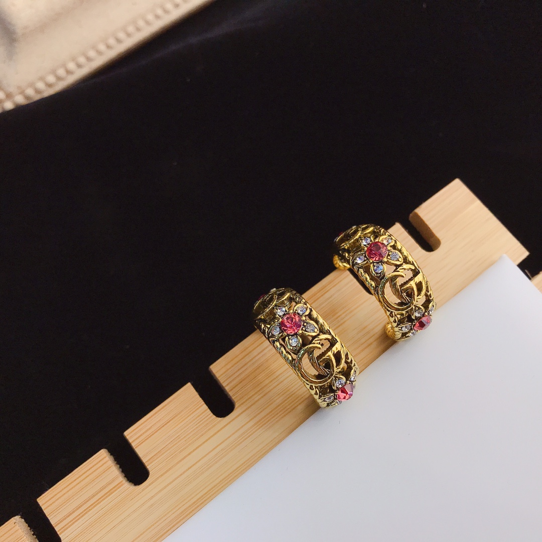 A235 Gucci copper vintage earrings 110312