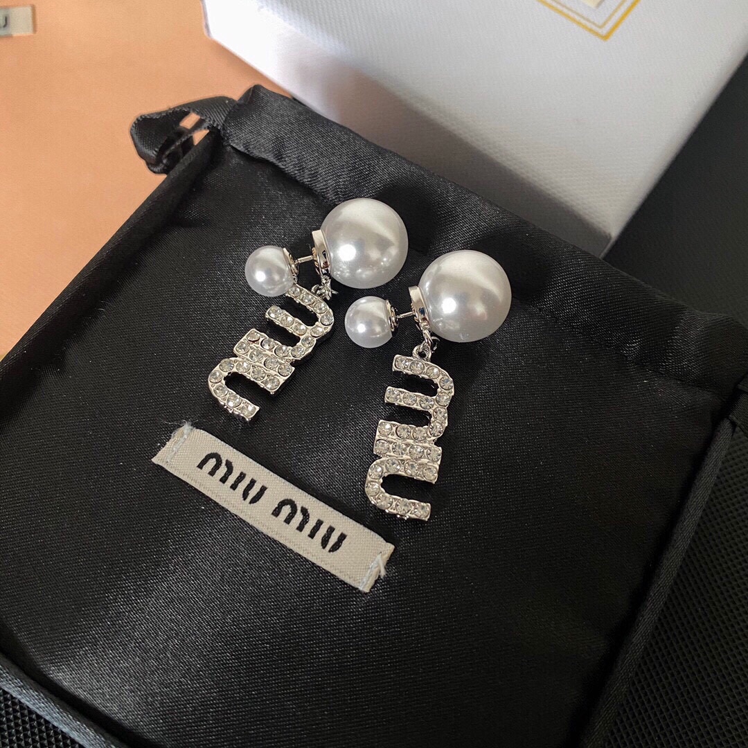 Miumiu pearls earrings 110600