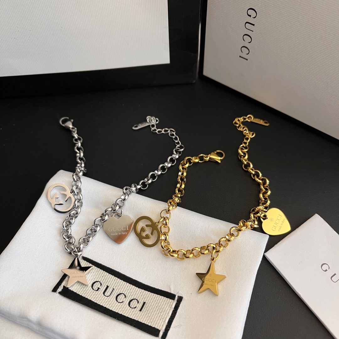 L119  Gucci Silver/Gold bracelet