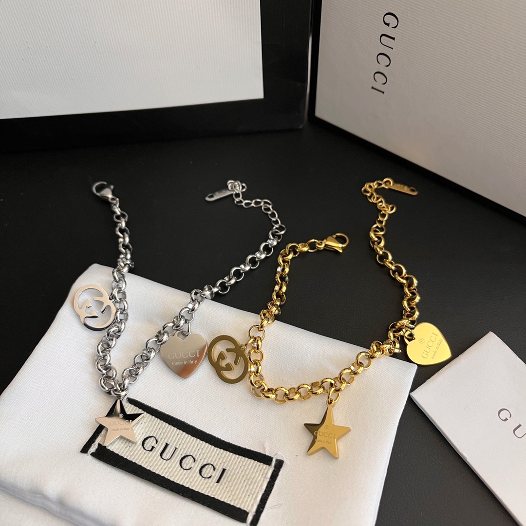 L119  Gucci Silver/Gold bracelet