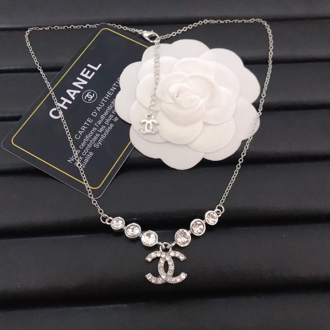 Chanel crystal earrings/necklace 111684