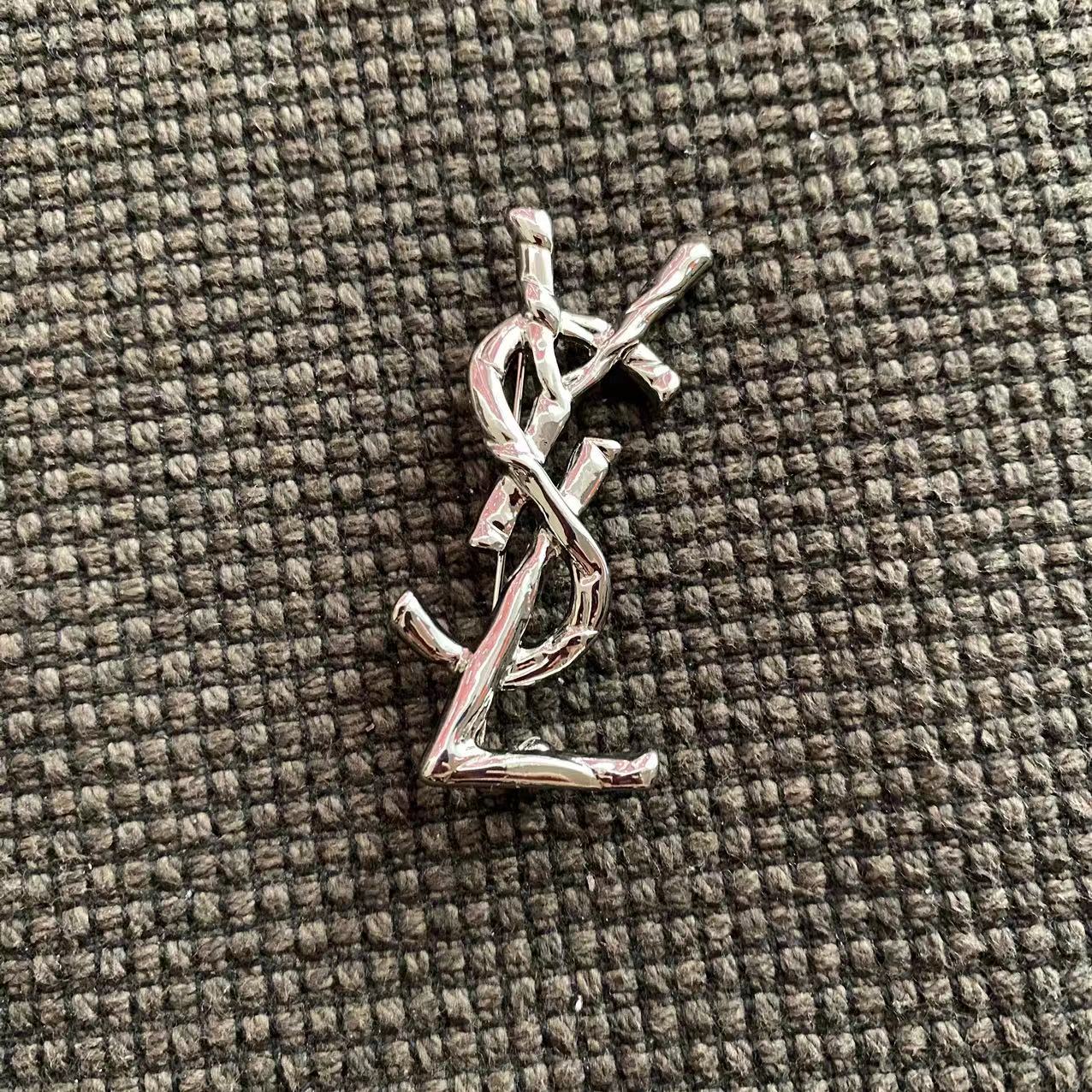 YSL Silver brooch