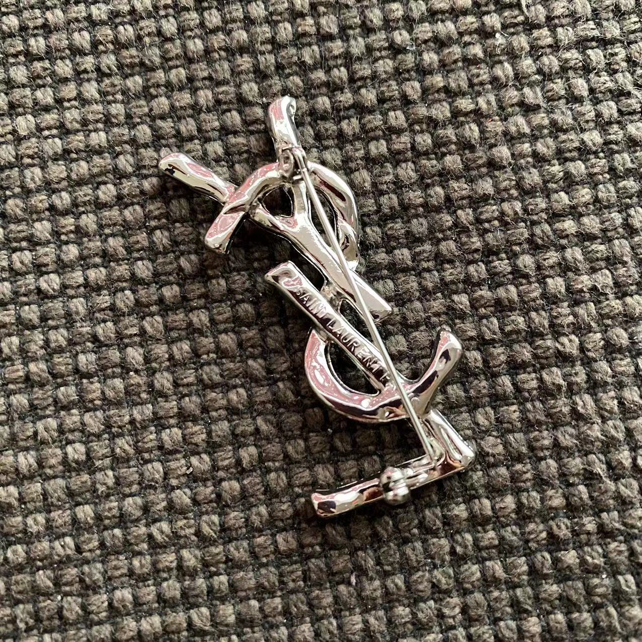 YSL Silver brooch