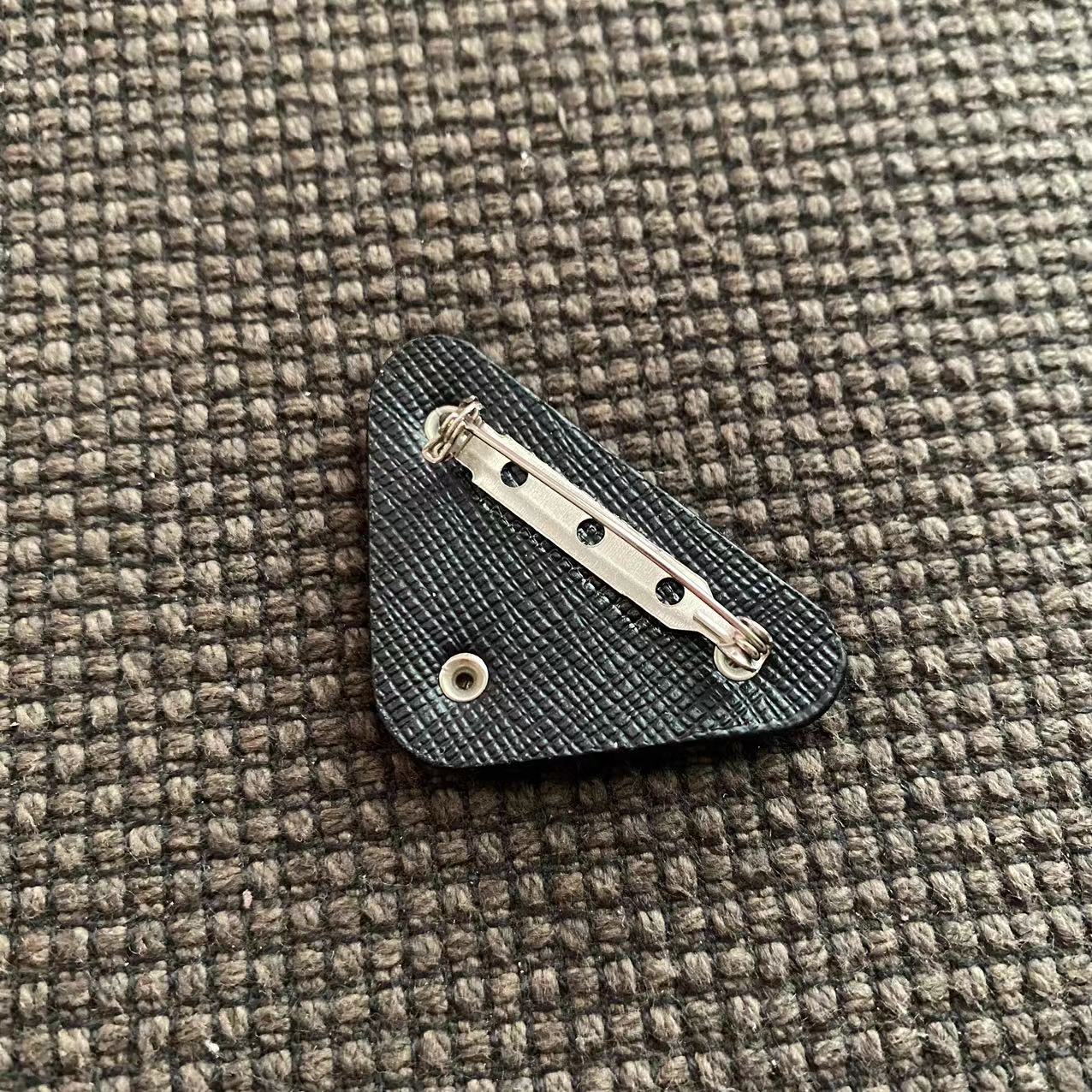 Big sale! New Prada leather triangle brooch