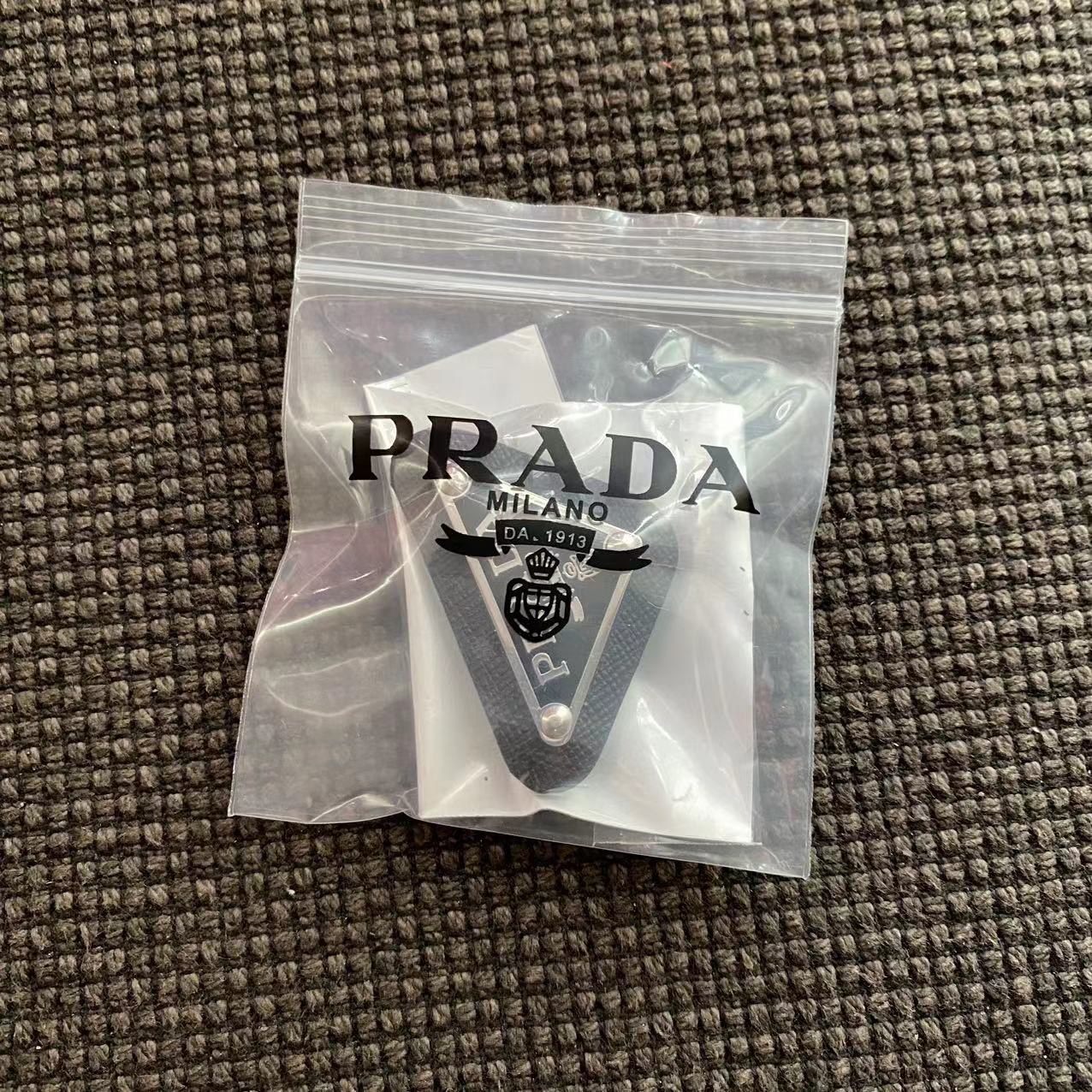 Big sale! New Prada leather triangle brooch