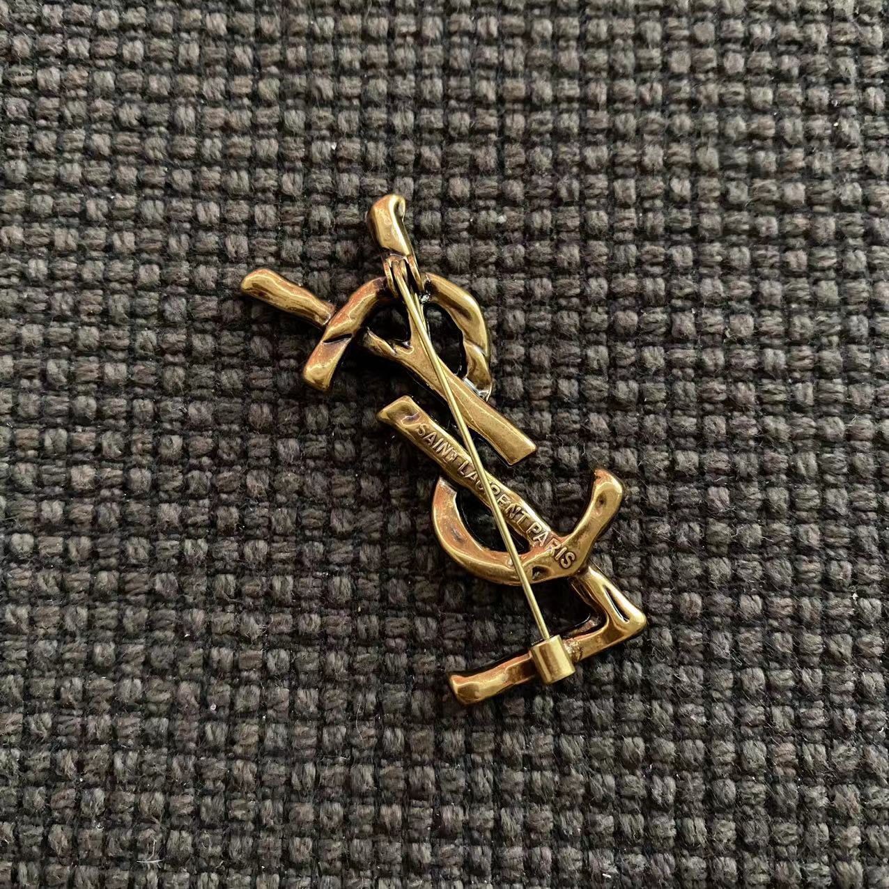 YSL copper vintage brooch 110890