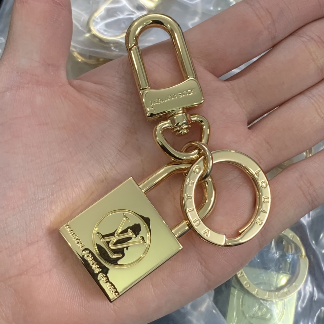 LV Louis vuitton lock key chain 112254