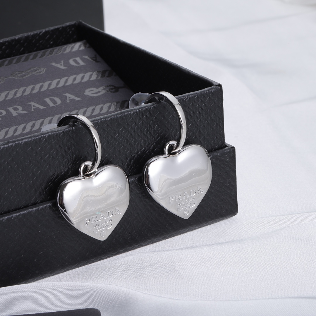 Prada silver heart earrings 112447