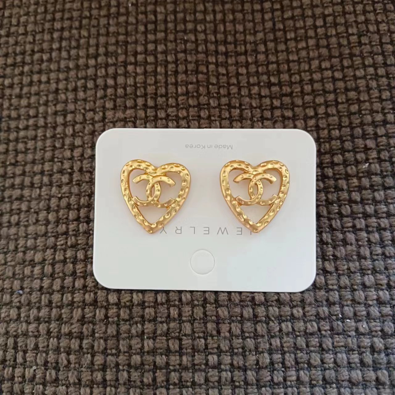 Special sale! New Chanel hollow heart earrings