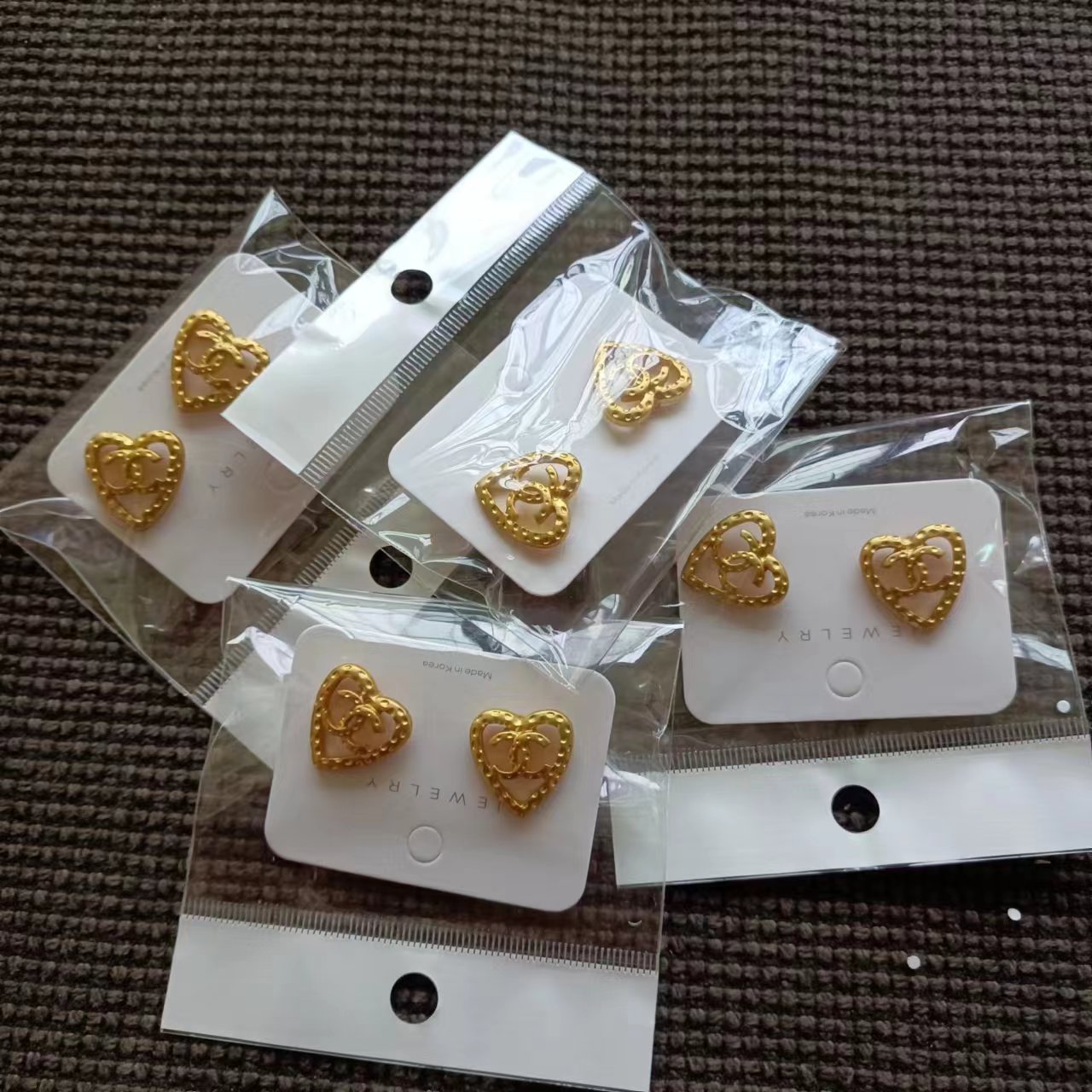 Special sale! New Chanel hollow heart earrings