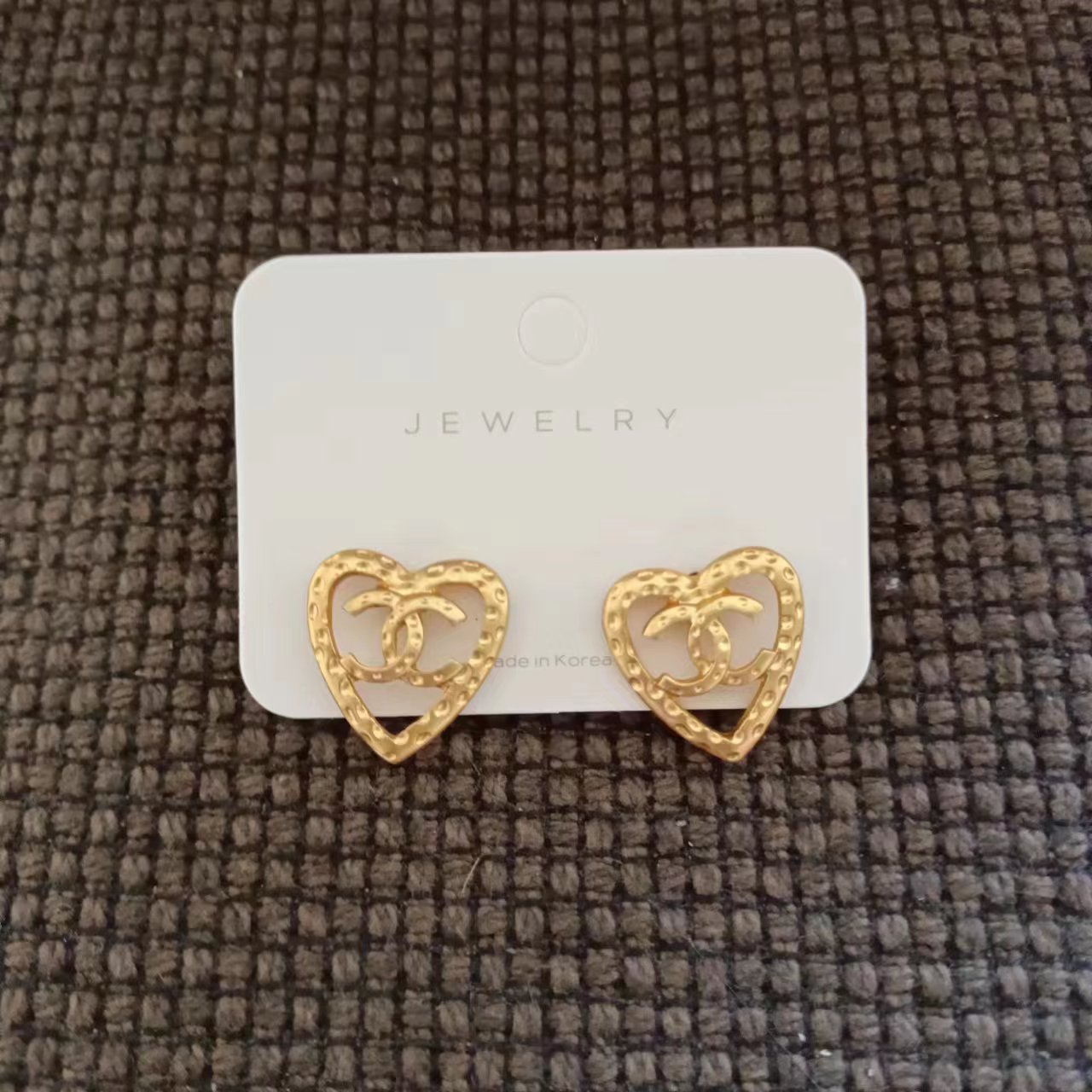 Special sale! New Chanel hollow heart earrings