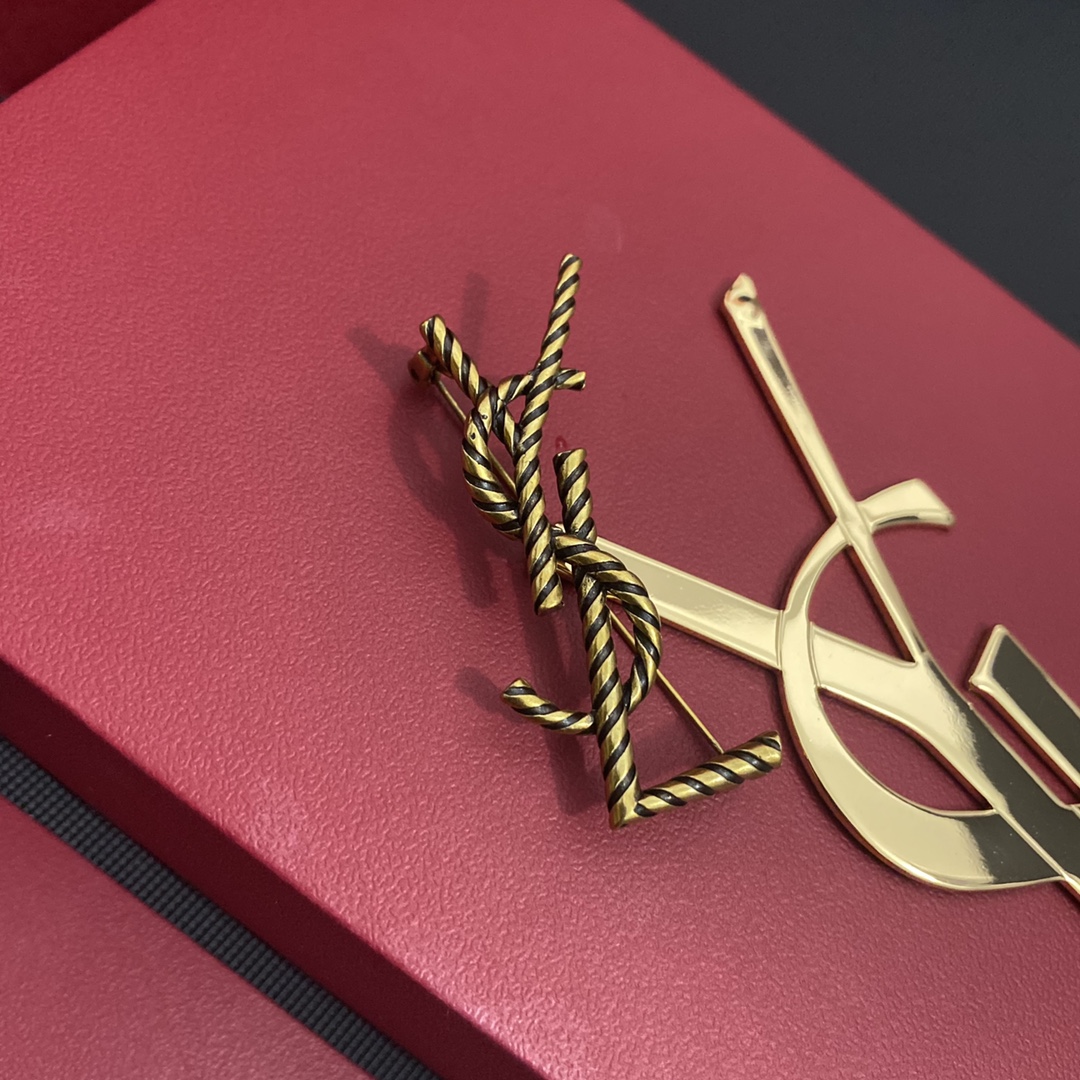 C248  YSL brooch