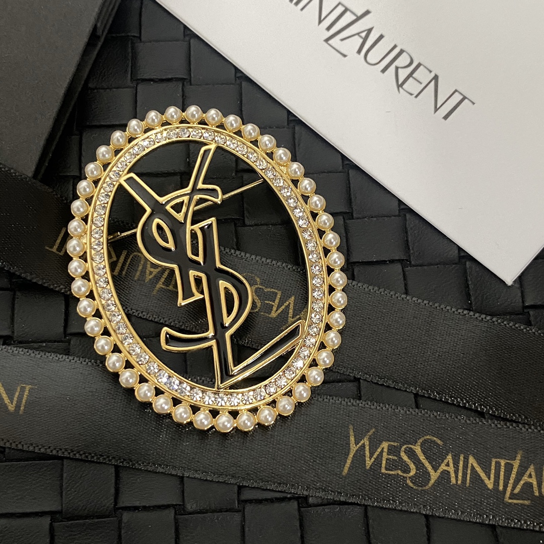 C249 YSL brooch