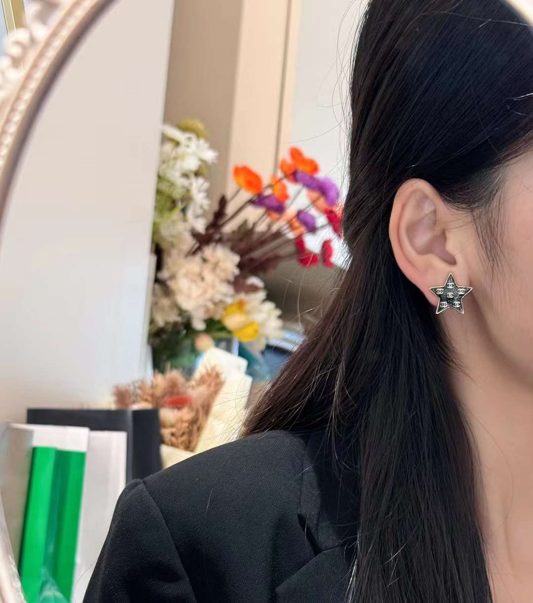 A973  Chanel star earrings