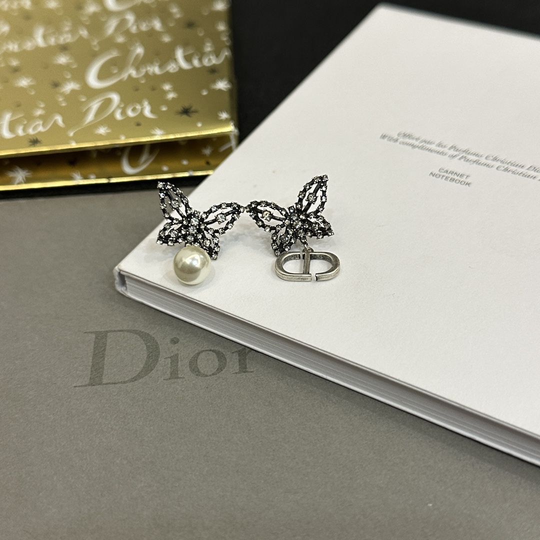 A448 Dior hollow butterfly earrings