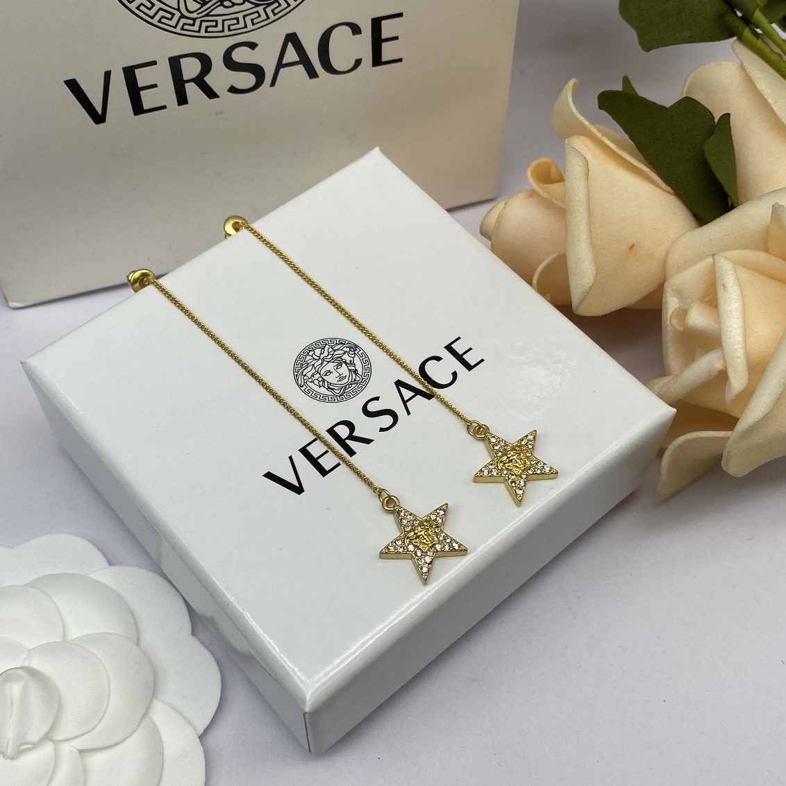Versace star earrings 113775