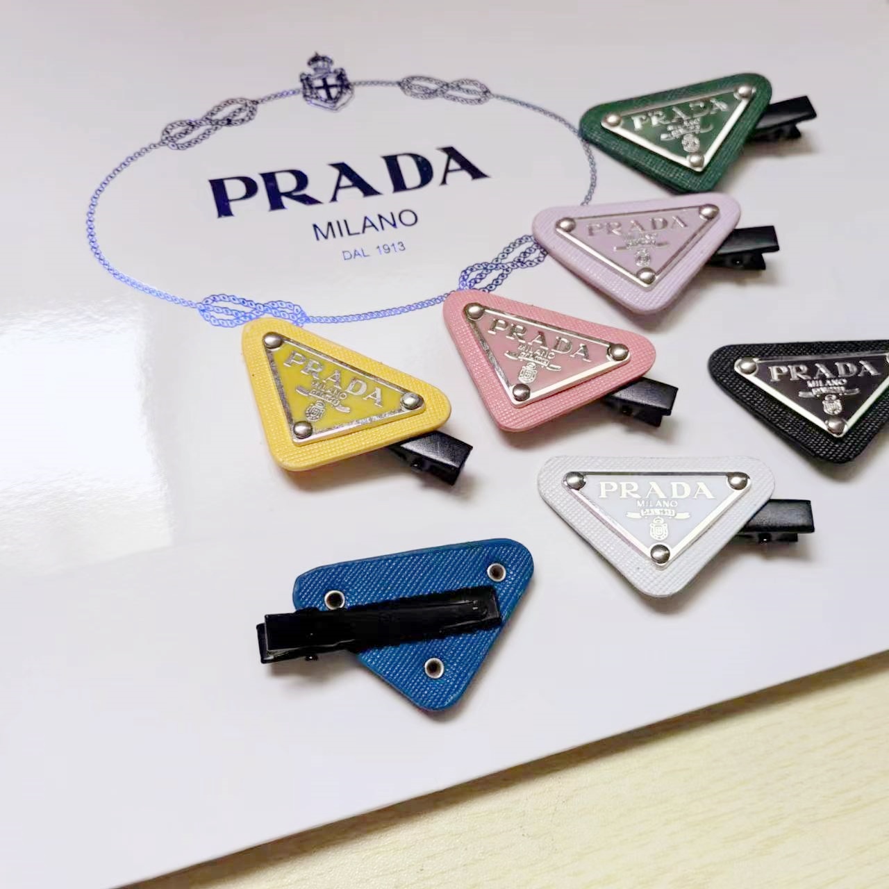 Prada triangle color hairclip 1pcs