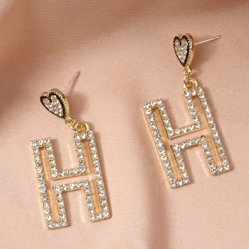 Hermes H heart earrings